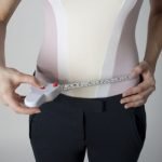 Man showing us how to use a tape measure